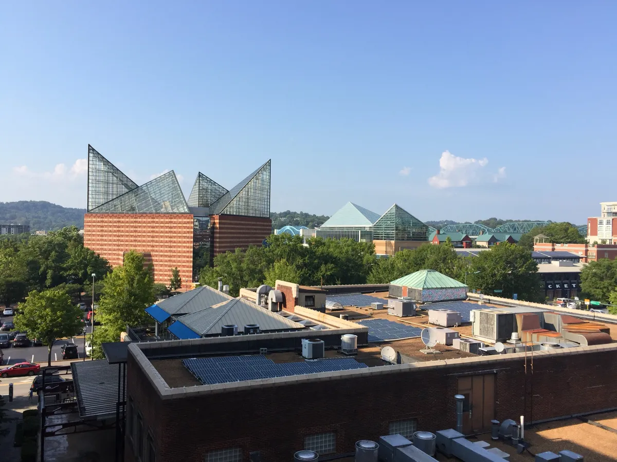 Skyline of Chattanooga, Tennessee circa 2017, featuring the triangular, glass roof of the aquarium. The skyline is not Chicago.