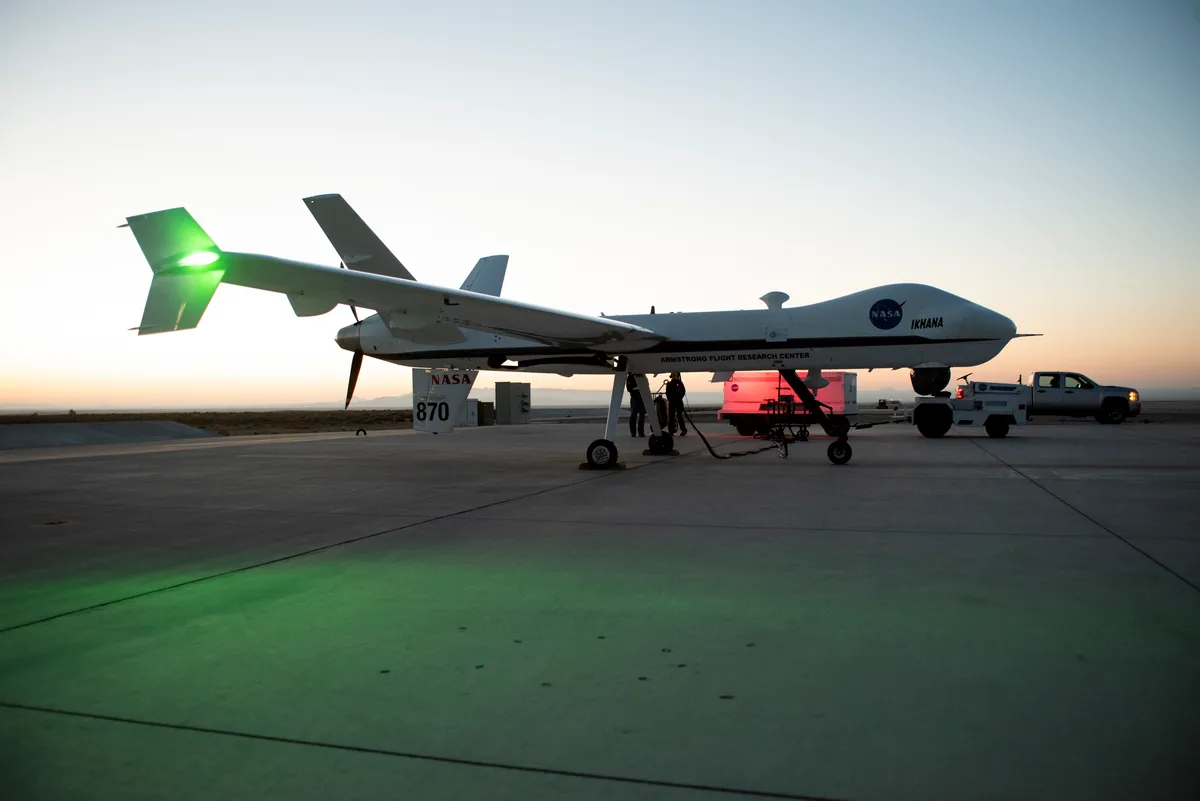 Aircraft maintenance crews at NASA‘s Armstrong Flight Research Center prepare the remotely-piloted Ikhana aircraft for a test flight of Ikhana. The test flight was performed to validate key technologies and operations necessary for FAA’s approval to fly the aircraft in the National Airspace System June 12, 2018, without a safety chase aircraft.